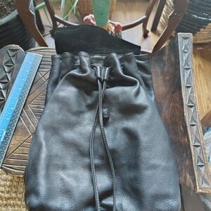 Elegant Black Leather Drawstring Backpack
